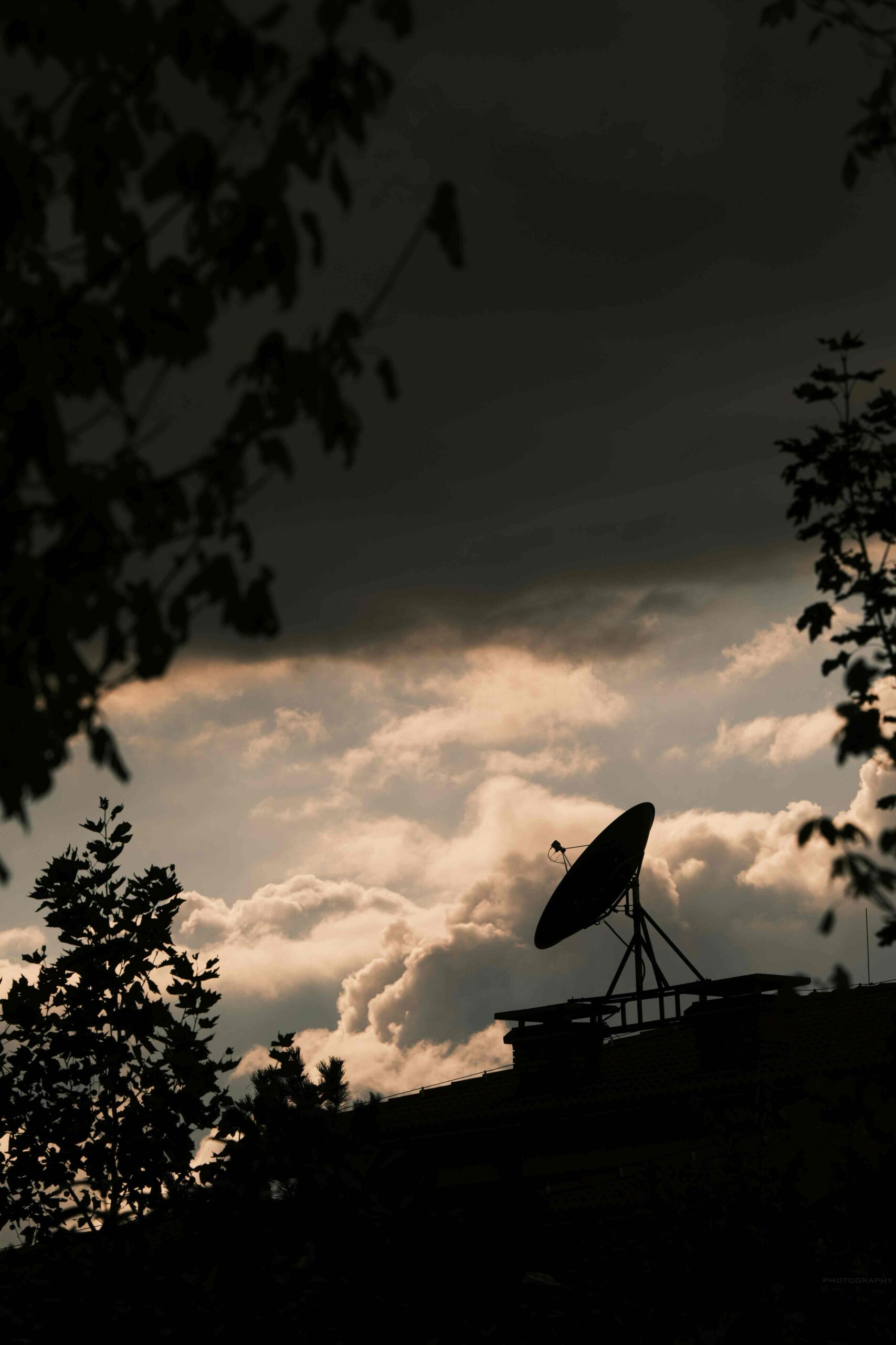 Satellite dish on a Cape Town roof checked during a DStv call-out visit